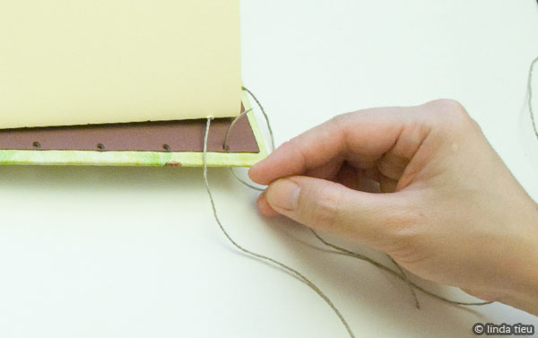 Showing the process of sewing your book