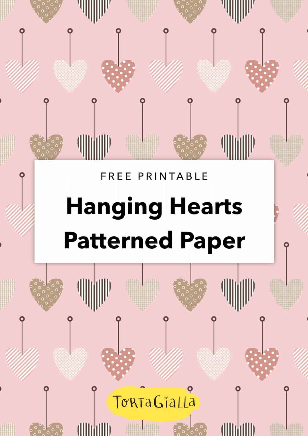 Looking for a pretty paper printable? Check out this free hanging hearts patterned paper design. Use it to decorate your planner, scrapbook and more!