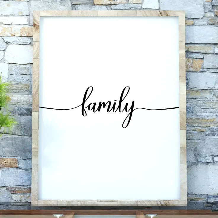 Free printable family wall decor, mockup in frame on wall. Download on tortagialla.com